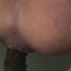 Filmed from behind over the toilet, tattooed Nazzy pushes out a long hanging turd that drops into the bowl. Presented in 720P vertical HD format. Over 2 minutes.